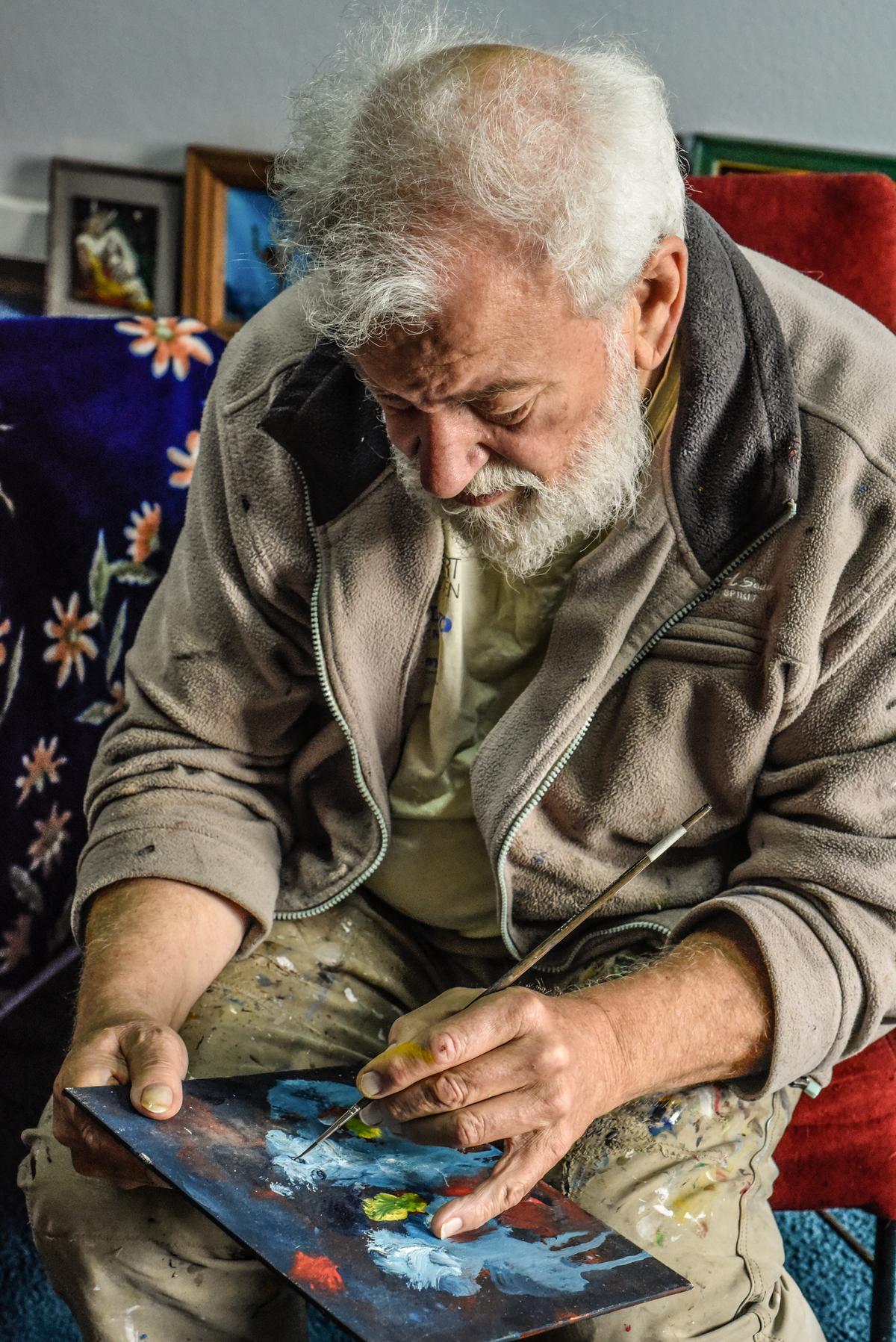 Artist Pieter Adriaans painting outside on São Jorge, Azores. Photo by Jorge Blayer Gois.